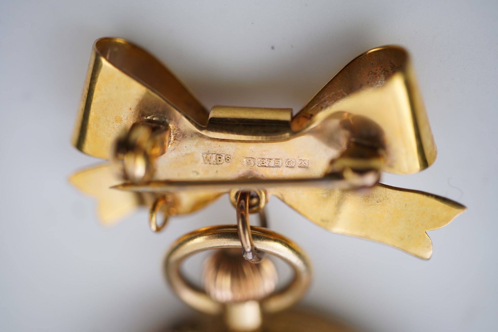 A gold fob watch, early 20th century and later